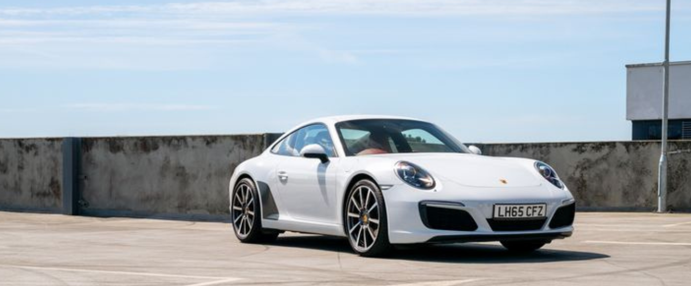 991 Carrera in white, front three-quarter